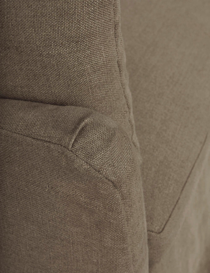 #size::84-w #size::72-w #color::mushroom #size::96-w | Close-up of the end of the sloped-arm on the Portola Mushroom brown linen Slipcover Sofa