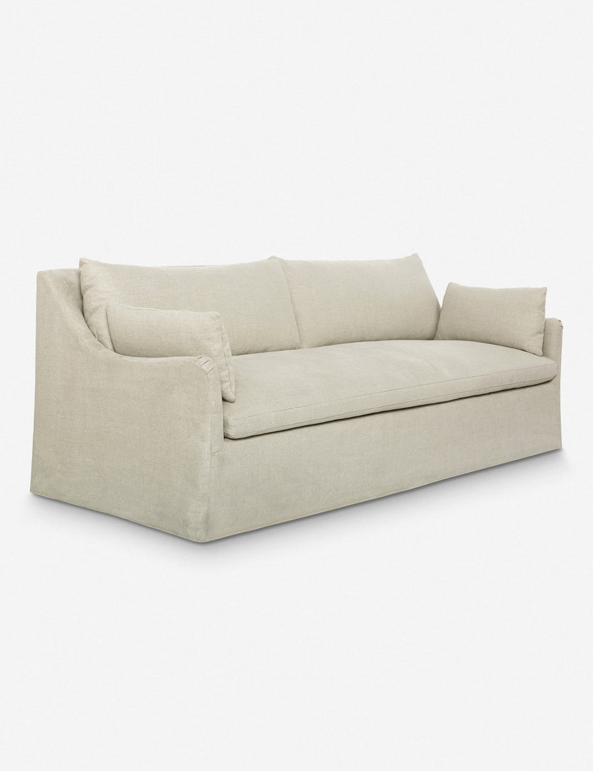 #size::72-w #size::96-w #color::natural #size::84-w | Angled view of the Portola Natural linen Slipcover Sofa
