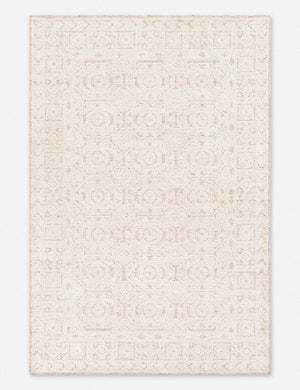 Helene ivory handwoven rug with tiled medallions and a square-patterned border