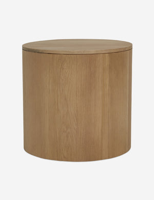 Rear view of the Kono round solid oak nightstand with one drawer