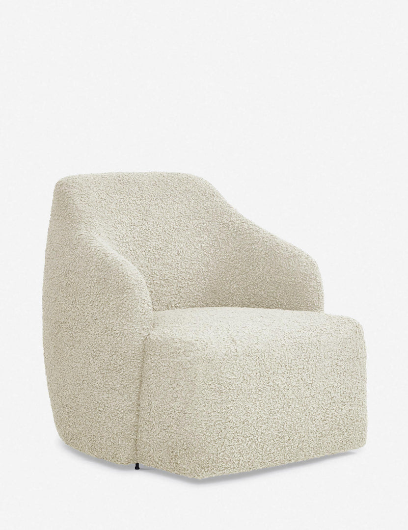 #color::cream-boucle | Angled view of the Tobi cream boucle swivel chair 
