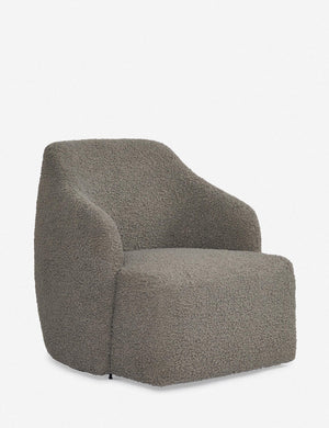 Angled view of the Tobi Gray Boucle swivel chair