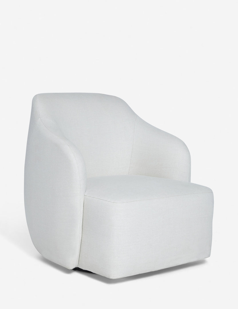 #color::natural | Angled view of the Tobi Natural linen swivel chair
