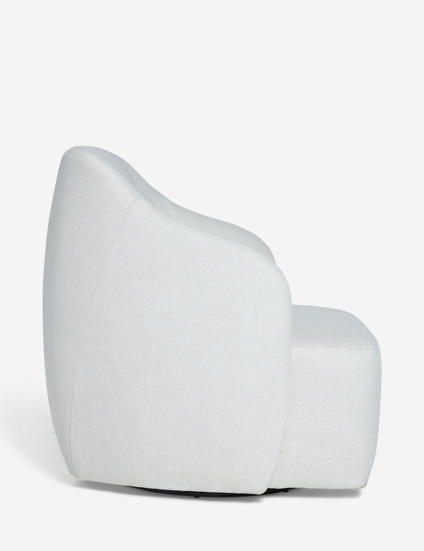 #color::natural | Side of the Tobi Natural linen swivel chair
