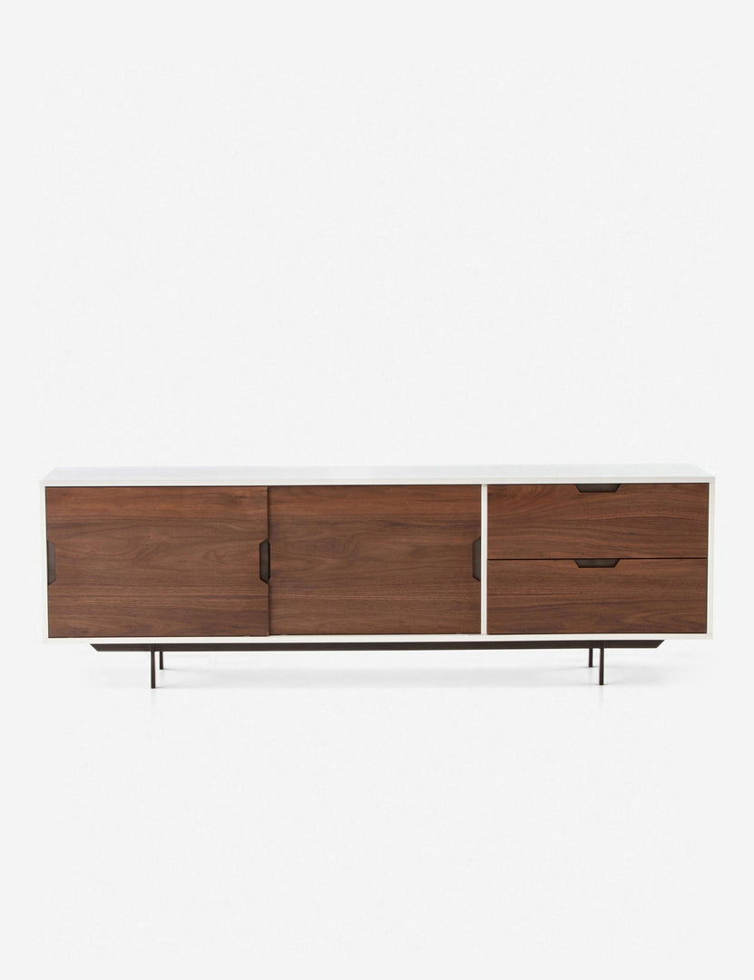 | Cordelle wooden media console with sliding cabinet doors wrapped in a high-gloss white frame