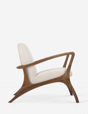 Side view of the Venturi white indoor and outdoor accent chair with wooden legs