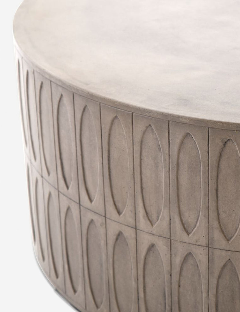 | Close-up of the accented side on the Mal concrete indoor and outdoor round coffee table