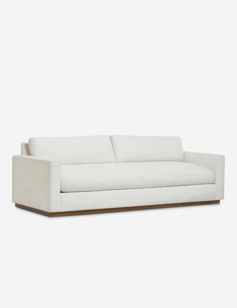 | Angled view of the Walden white sofa