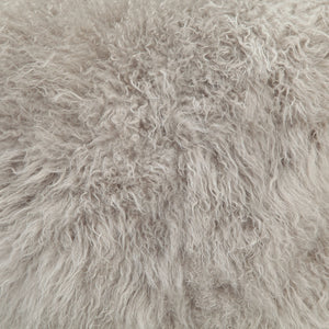 Close-up of the super soft cashmere fabric on the Madison light grey Pillow