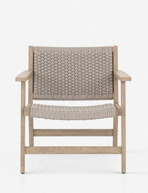 Ylva Natural Indoor / Outdoor Accent Chair featuring a braided seat and back and wooden frame